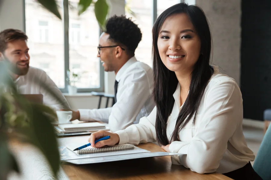 A smiling woman in the office